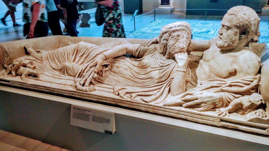 Marble sarcophagus lid with reclining couple MET museum 5th ave